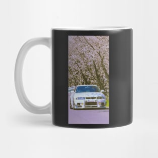 r33 under cherry flowers Mug